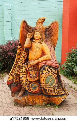 Stock Photo -  statue sculpture wood carving art district del. Fotosearch