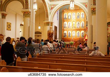 Stock Photography -  taking communion at the cathedtal basilica of. Fotosearch