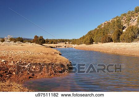 Stock Image -  tecolote creek river strean new mexico nm view. Fotosearch