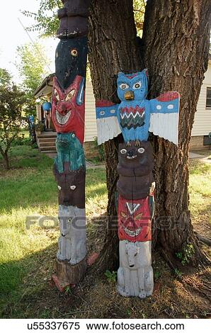 totem poles glenn stark yard art sculpture ks View Large Photo Image Stock Photography - totem poles glenn stark yard art sculpture ks. Fotosearch