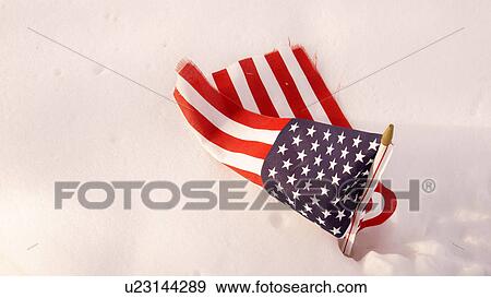 usa flag in snow winter vietnam vets memorial View Large Photo Image Stock Photo - usa flag in snow winter vietnam vets memorial. Fotosearch