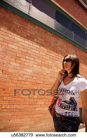 Stock Photo -  woman female walking fashion people girl person. Fotosearch