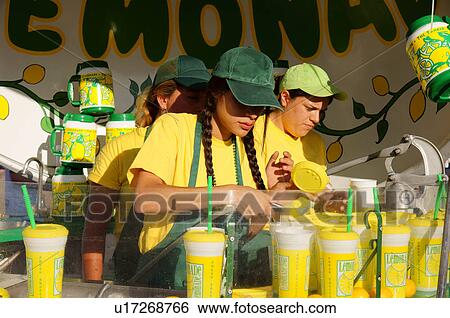 Stock Photograph -  workers making lemonaide lemonade stand vendor. Fotosearch