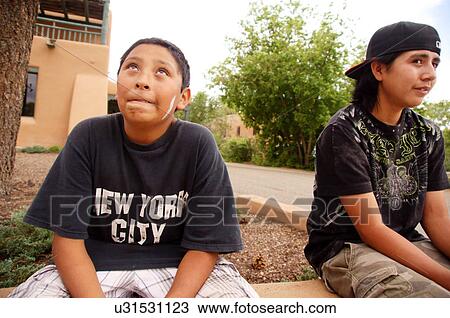 Stock Image -  young boys mumford and sons concert taos new nm. Fotosearch