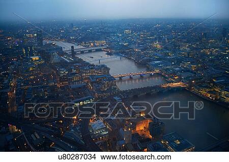 Aerial cityscape of river Thames and bridges at dawn, London, England, UK View Large Photo Image Picture - Aerial cityscape of river Thames and bridges at dawn, London, England, UK. Fotosearch