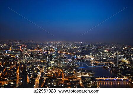 Aerial cityscape of river Thames at night, London, England, UK View Large Photo Image Stock Photo - Aerial cityscape of river Thames at night, London, England, UK. Fotosearch