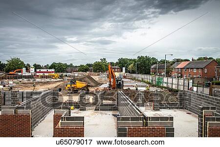 Stock Photo - Brick walls on construction site. Fotosearch