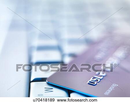 Business credit card on laptop keyboard View Large Photo Image Stock Photo - Business credit card on laptop keyboard. Fotosearch