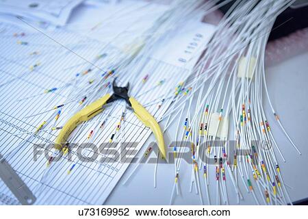 Cables and clippers in electronics assembly factory View Large Photo Image Stock Image - Cables and clippers in electronics assembly factory. Fotosearch