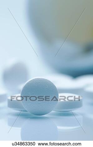 Close up of circular white pill, Tramadol View Large Photo Image Stock Image - Close up of circular white pill, Tramadol. Fotosearch