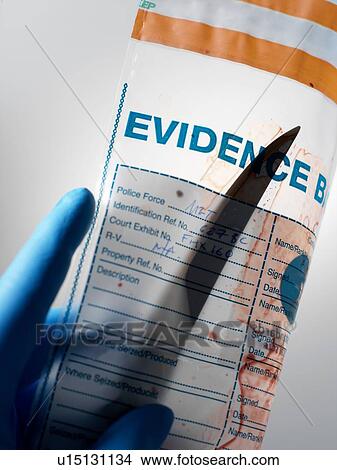 Picture - Evidence from knife crime incident in forensic bag. Fotosearch