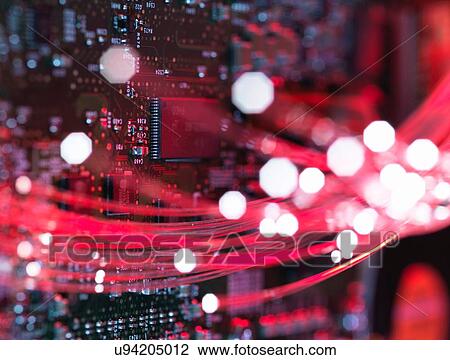 Fibre optics flowing through circuit boards from a laptop computer, close-up View Large Photo Image Stock Image - Fibre optics flowing through circuit boards from a laptop computer, close-up. Fotosearch
