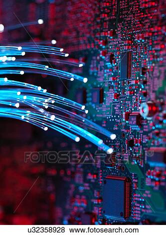 Fibre optics flowing through circuit boards from a laptop computer, close-up View Large Photo Image Stock Photo - Fibre optics flowing through circuit boards from a laptop computer, close-up. Fotosearch