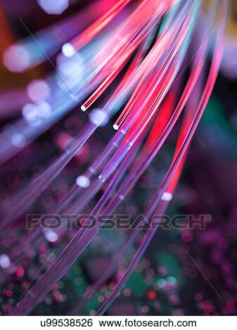 Fibre optics used to send data darting past computer circuit board View Large Photo Image Stock Photograph - Fibre optics used to send data darting past computer circuit board. Fotosearch
