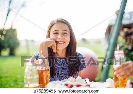 Girl at summer garden party View Large Photo Image Stock Photography - Girl at summer garden party. Fotosearch