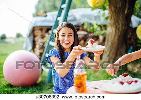 Girls having fun at summer garden party View Large Photo Image Stock Image - Girls having fun at summer garden party. Fotosearch