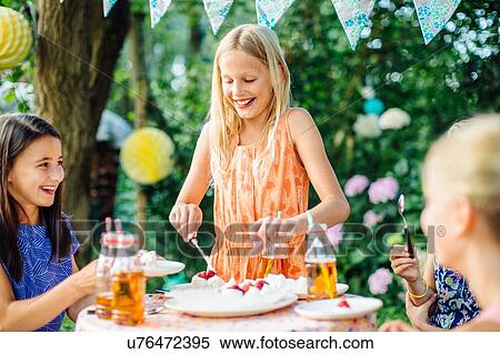 Girls having fun at summer garden party View Large Photo Image Stock Photography - Girls having fun at summer garden party. Fotosearch