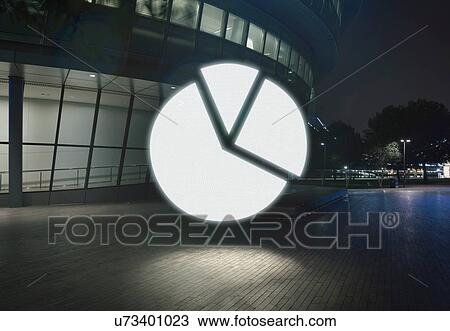 Glowing pie chart symbol in city at night View Large Photo Image Stock Image - Glowing pie chart symbol in city at night. Fotosearch