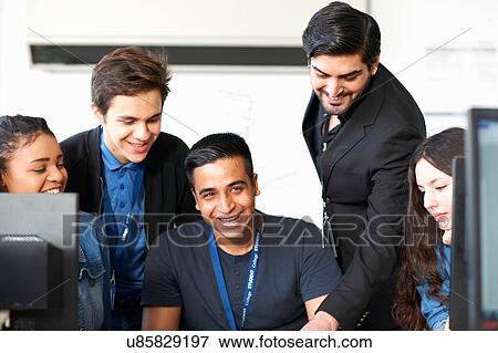 Group of students in computer classroom View Large Photo Image Stock Photo - Group of students in computer classroom. Fotosearch