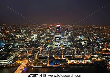 High angle cityscape of river Thames and city lights at night, London, England, UK View Large Photo Image Stock Photo - High angle cityscape of river Thames and city lights at night, London, England, UK. Fotosearch