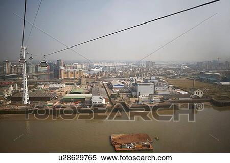 Stock Photography - High angle view of Docklands and cable car, London, England, UK. Fotosearch