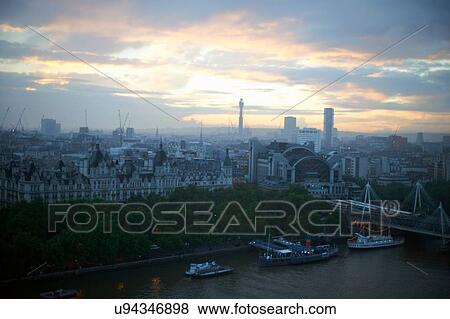 High angle view of river Thames and waterfront at dawn, London, England, UK View Large Photo Image Stock Photo - High angle view of river Thames and waterfront at dawn, London, England, UK. Fotosearch
