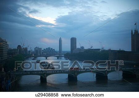 Stock Photo - High angle view of the Thames and Westminster bridge at dawn, London, England, UK. Fotosearch