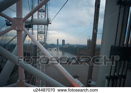 Stock Image - High angle view of the Thames from London Eye at dawn, London, England, UK. Fotosearch
