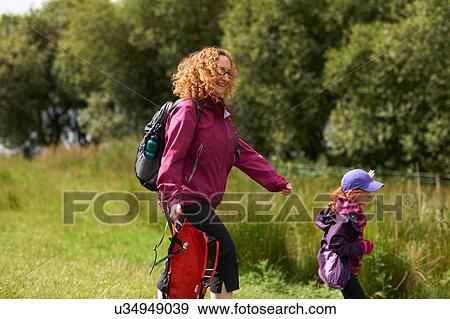 Mother and daughter, walking, Lake District, Cumbria, UK View Large Photo Image Stock Photo - Mother and daughter, walking, Lake District, Cumbria, UK. Fotosearch