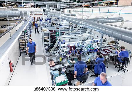 Overview of production line in electronics factory View Large Photo Image Stock Photo - Overview of production line in electronics factory. Fotosearch