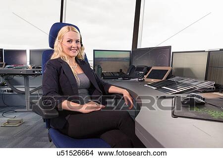 Portrait of female air traffic control tower worker View Large Photo Image Picture - Portrait of female air traffic control tower worker. Fotosearch