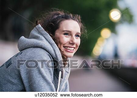Portrait of happy female runner taking a break View Large Photo Image Stock Image - Portrait of happy female runner taking a break. Fotosearch