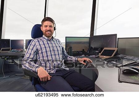 Stock Photography - Portrait of male air traffic control tower worker. Fotosearch