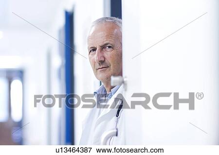 Portrait of male doctor View Large Photo Image Stock Photo - Portrait of male doctor. Fotosearch
