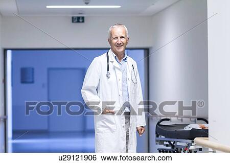 Portrait of male doctor View Large Photo Image Stock Photograph - Portrait of male doctor. Fotosearch