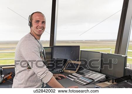 Portrait of man working in air traffic control tower View Large Photo Image Stock Image - Portrait of man working in air traffic control tower. Fotosearch
