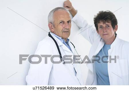 Portrait of two doctors View Large Photo Image Stock Photo - Portrait of two doctors. Fotosearch