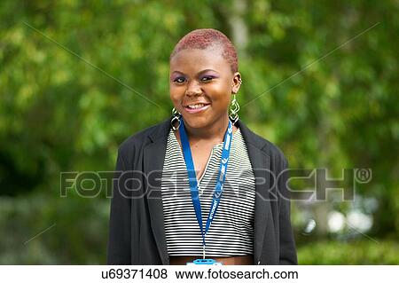Portrait of young woman, outdoors View Large Photo Image Stock Photo - Portrait of young woman, outdoors. Fotosearch