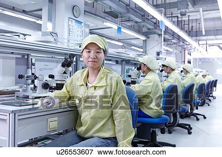 Quality check station at factory producing flexible electronic circuit boards. Plant is located in the south of China, in Zhuhai, Guangdong province View Large Photo Image Stock Photo - Quality check station at factory producing flexible electronic circuit boards. Plant is located in the south of China, in Zhuhai, Guangdong province. Fotosearch
