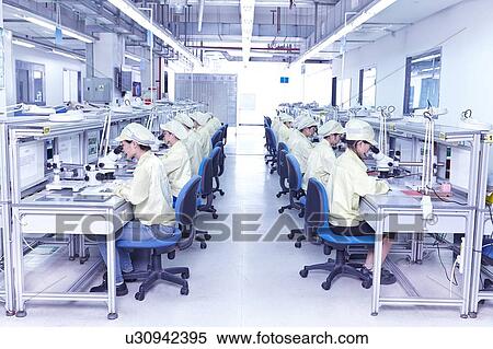 Quality check station at factory producing flexible electronic circuit boards. Plant is located in the south of China, in Zhuhai, Guangdong province View Large Photo Image Stock Photography - Quality check station at factory producing flexible electronic circuit boards. Plant is located in the south of China, in Zhuhai, Guangdong province. Fotosearch