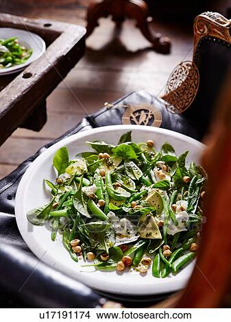 Salad with baby spinach and hazelnuts View Large Photo Image Picture - Salad with baby spinach and hazelnuts. Fotosearch