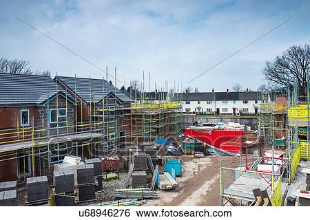 Stock Photograph - Scaffolding on building of construction site. Fotosearch