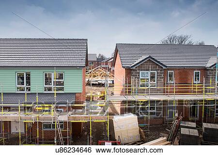 Stock Photograph - Scaffolding on building of construction site. Fotosearch