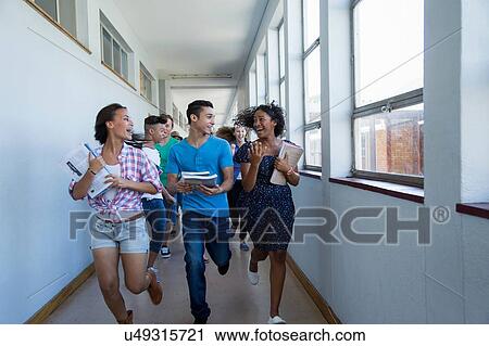Students running down hallway, laughing View Large Photo Image Stock Image - Students running down hallway, laughing. Fotosearch