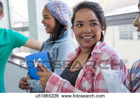 Students standing by window, chatting View Large Photo Image Stock Photograph - Students standing by window, chatting. Fotosearch