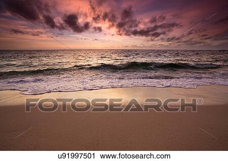 Sunrise over ocean and coastline, Prevelly Beach, Calgardup Bay, Prevelly, Western Australia, Australia View Large Photo Image Stock Image - Sunrise over ocean and coastline, Prevelly Beach, Calgardup Bay, Prevelly, Western Australia, Australia. Fotosearch