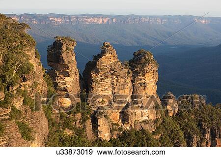 Stock Photo - Three Sisters rock formationm Jamison Valley, Blue Mountain National Park, New South Wales, Australia. Fotosearch