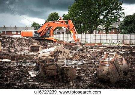 Tractor on construction site View Large Photo Image Stock Photo - Tractor on construction site. Fotosearch