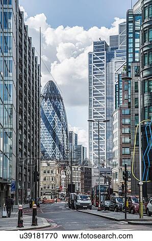 View of city street and Gherkin building, London, England, UK View Large Photo Image Stock Image - View of city street and Gherkin building, London, England, UK. Fotosearch