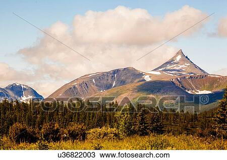 Stock Image - View of mountain peak and forest, Ural mountains, Russia. Fotosearch